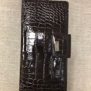 Chocolate brown-ish color Kate Spade clutch purse.